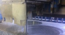 031011_cnc_machine_cutting_the_top_drinking_hole_of_the_granite_fountain_under_cooling_fluid
