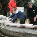Children pond dipping at a Discovery Day at the Isis Education Centre
