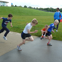 Children_do_a_sprint_finish_on_the_timing_track_at_the_hub_in_the_regent_s_park_square