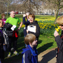 Volunteer with walkers on a guided spring walk