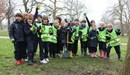 Local_school_children_having_fun_planting_bluebells_in_hyde_park_on_20_march_2013_listing