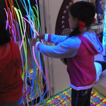Child in sensory room at the Isis Education Centre in Hyde Park
