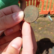 A_coin_found_during_the_community_archaeology_dig_in_greenwich_park_square